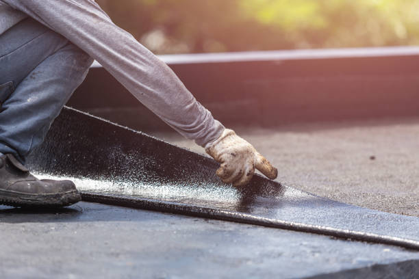 Professional Waterproofing technician working in Russellville, KY